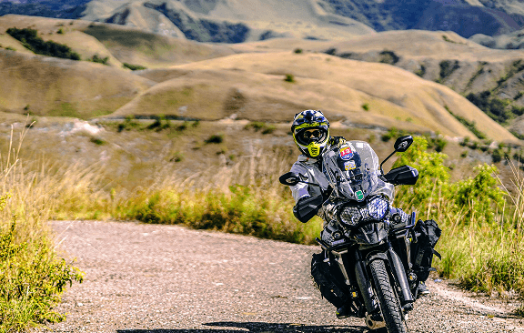 Sumba island landscape with motorcycle